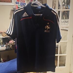 adidas Navy Polo with White Shoulder Stripes and Red Accents